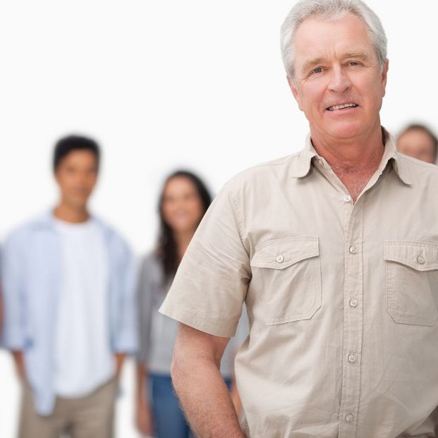 bigstock Mature man with young people b 29090720