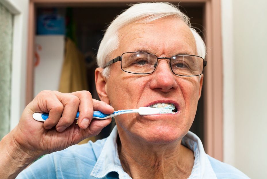 bigstock Senior Man Brushing His Teeth 41478175