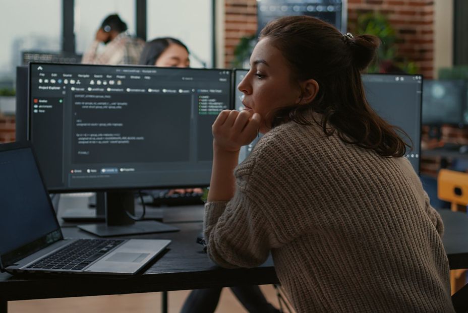 bigstock Junior Developer Putting Lapto 452384195