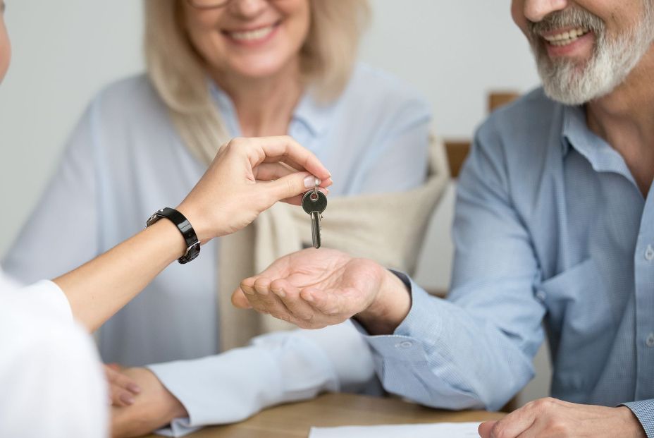 bigstock realtor giving senior aged cou 238360432 (1)