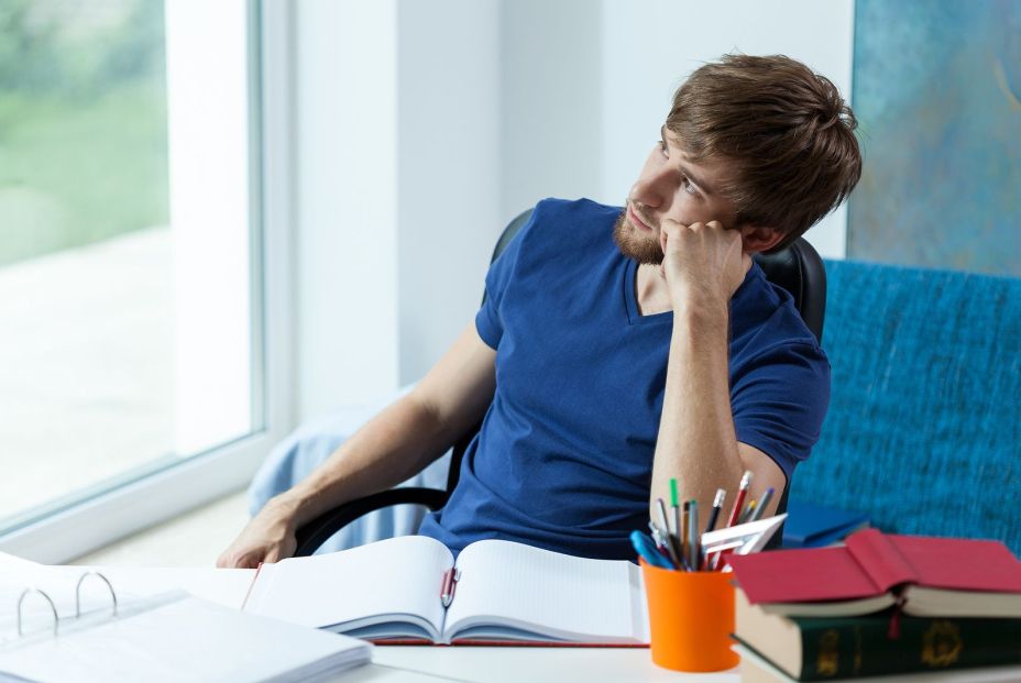 bigstock Student Looking Through The Wi 72244381