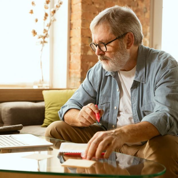 bigstock Senior Man Working With Laptop 324041821