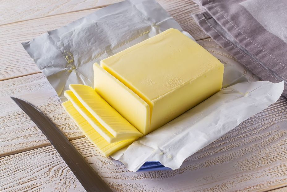 bigstock Slices Of Fresh Yellow Butter  348446080