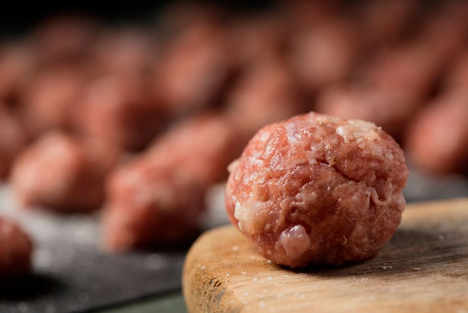 bigstock closeup of a raw meatball on a 311926510