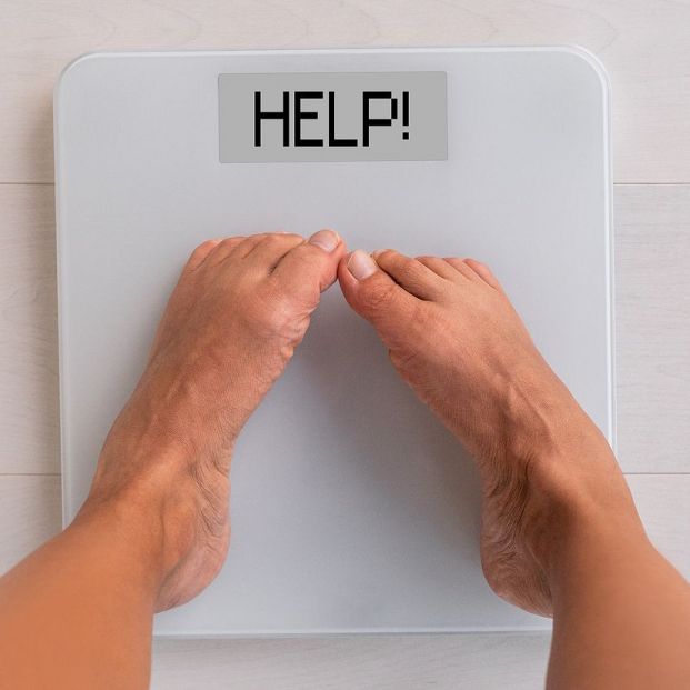 bigstock HELP weight scale showing the  312634546