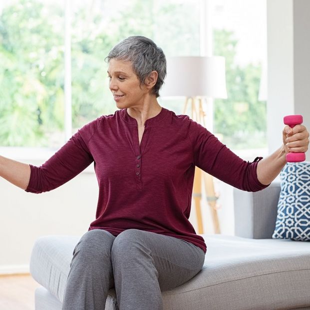 bigstock Senior woman lifting weights a 276244342