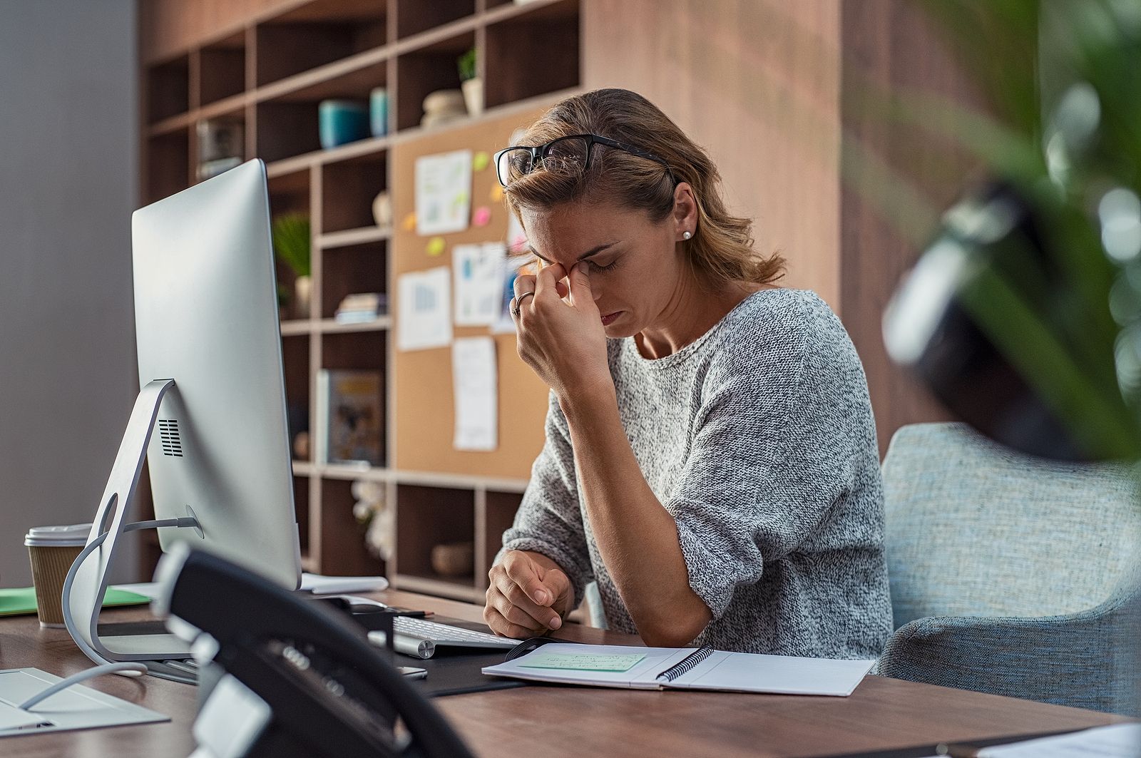 bigstock Exhausted businesswoman having 286511260