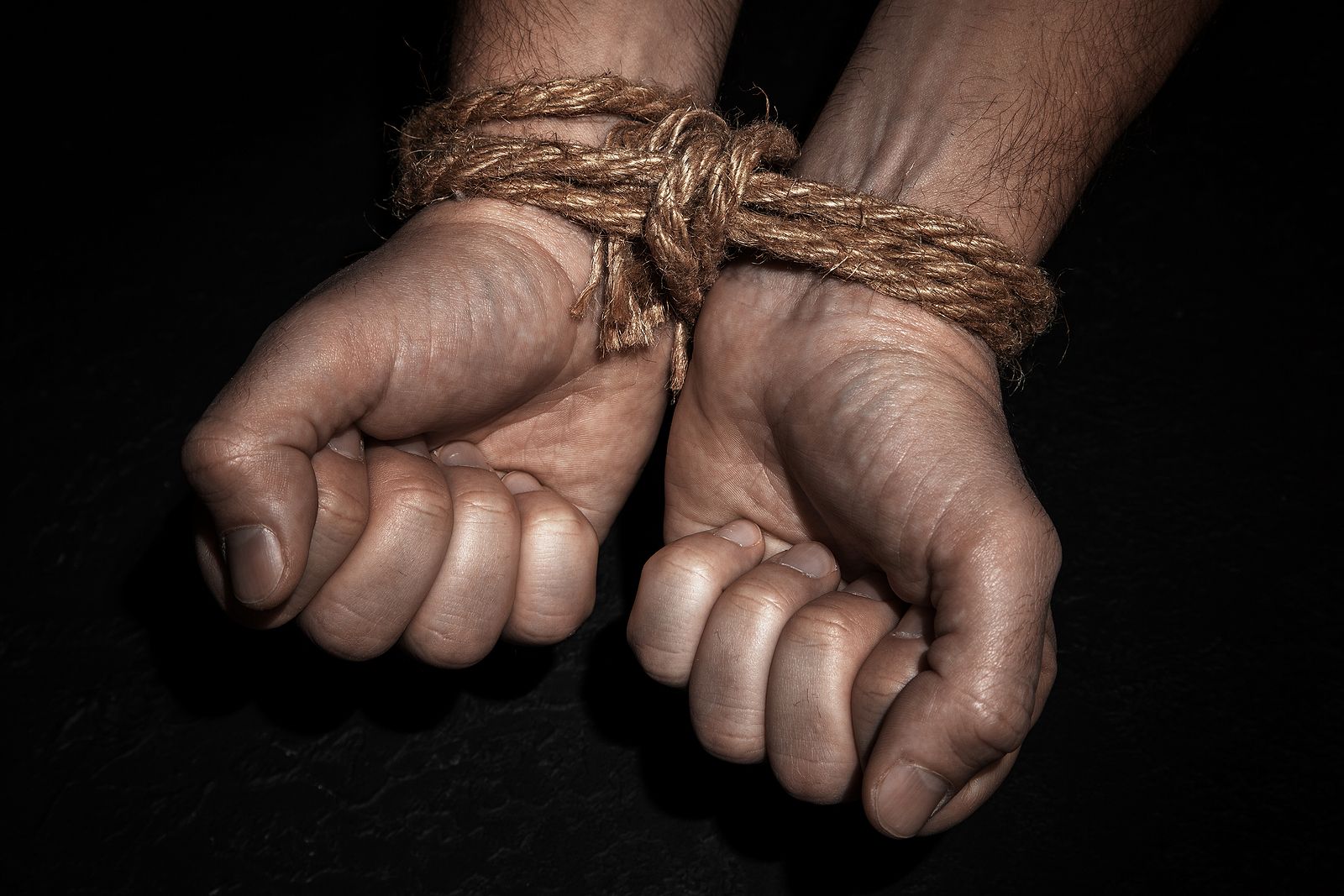 bigstock Man With Hands Tied With Rope  272183233