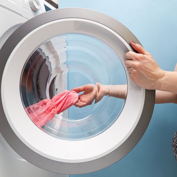 bigstock Girl Takes Out The Laundry Fro 366808921