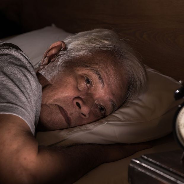 bigstock Depressed Senior Man Lying In  331050355