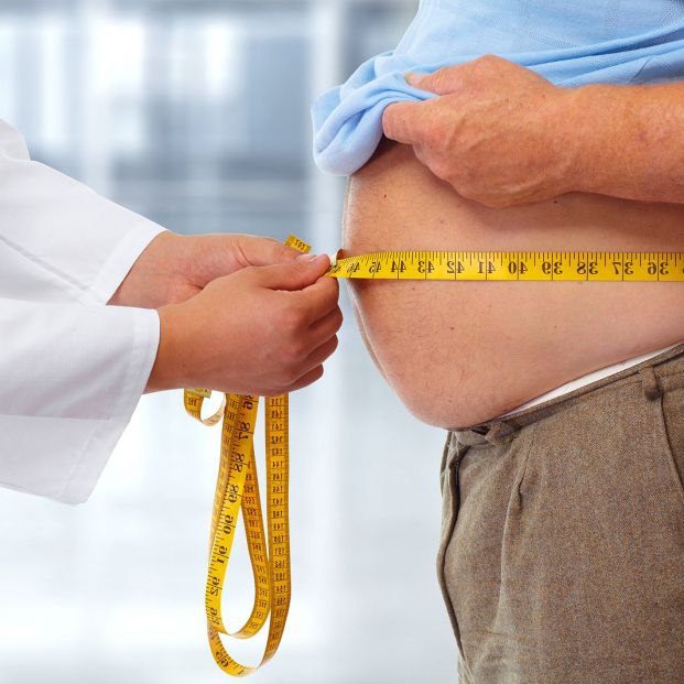 bigstock Doctor measuring obese man wai 110880518