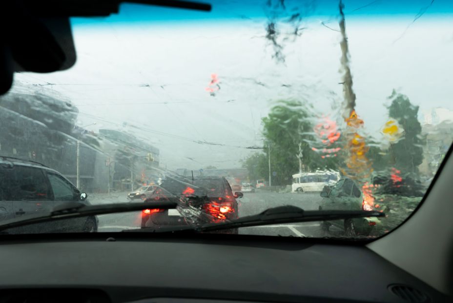 bigstock Driving Car In The Rain On Wet 340435369