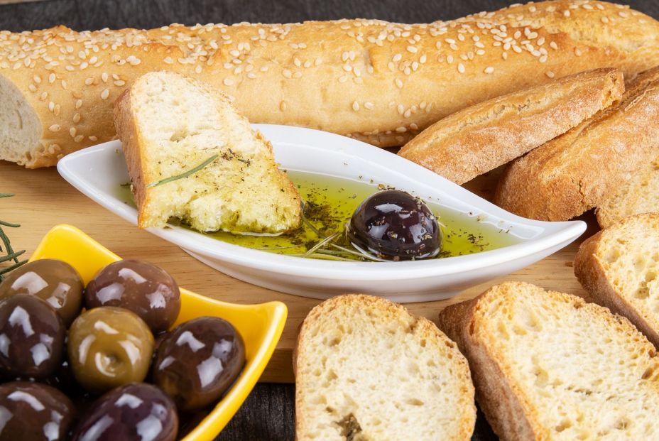 bigstock The Bread Dipped In Olive Oil  334379251
