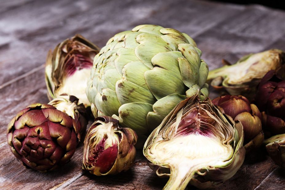 bigstock Artichokes On Grey Background  302144512