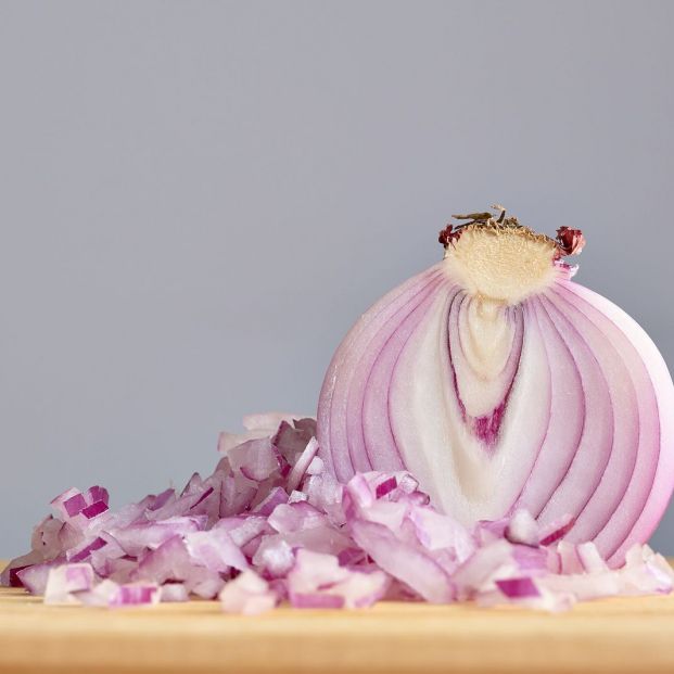 bigstock Half A Raw Red Onion With A Pi 374745448