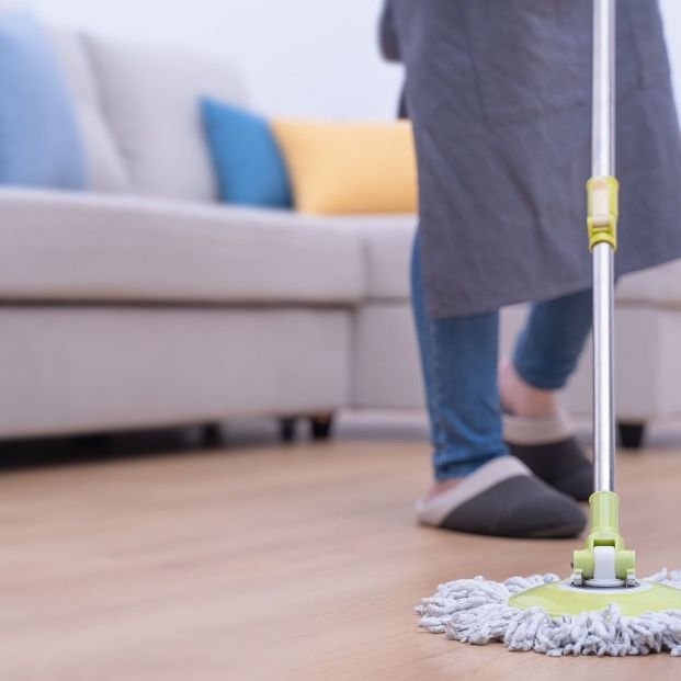 bigstock Mop Floors Young Woman Washin 360508429