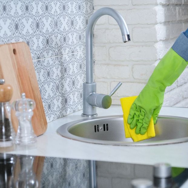 bigstock Woman In Gloves With Rag Clean 347880304 bigstock Woman In Gloves With Rag Clean 347880304