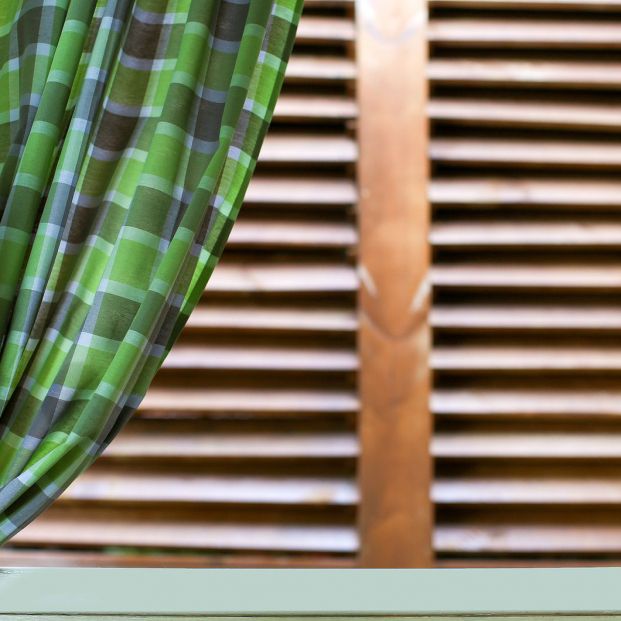 bigstock Green curtain on window with w 211194082