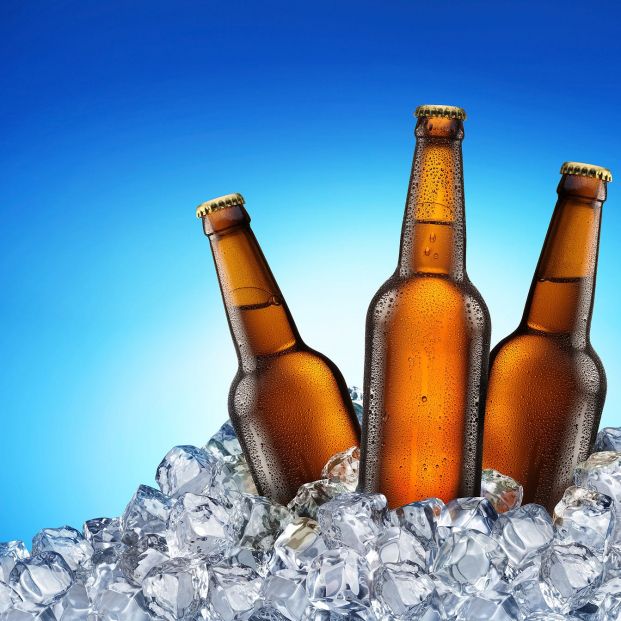 bigstock Three beer bottles getting coo 12362264 bigstock Three beer bottles getting coo 12362264