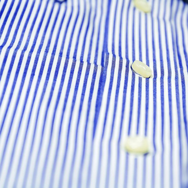 bigstock The Button Of A Blue Striped S 387618493 bigstock The Button Of A Blue Striped S 387618493