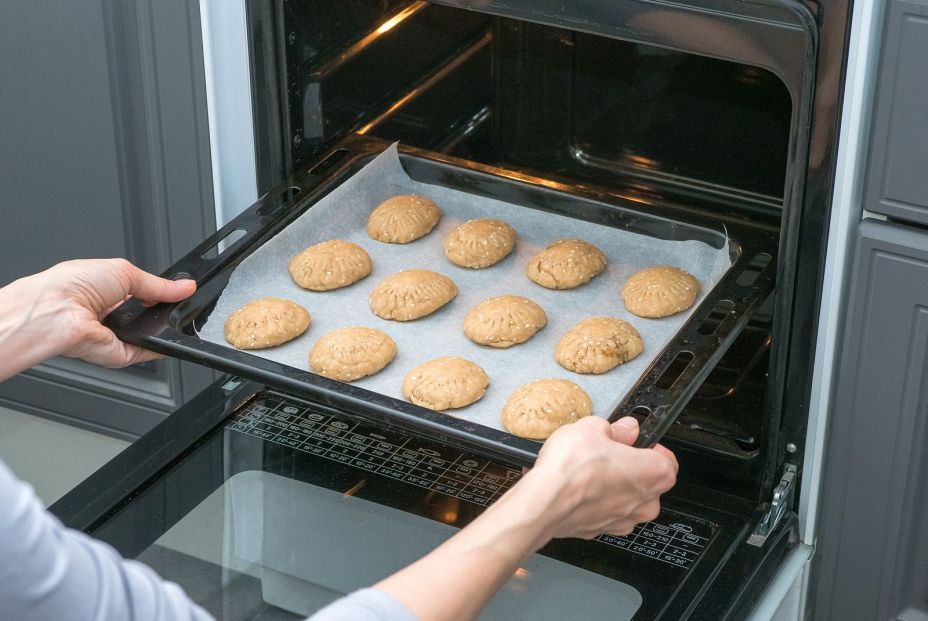 bigstock The Cook Bakes Cookies In The  349071832