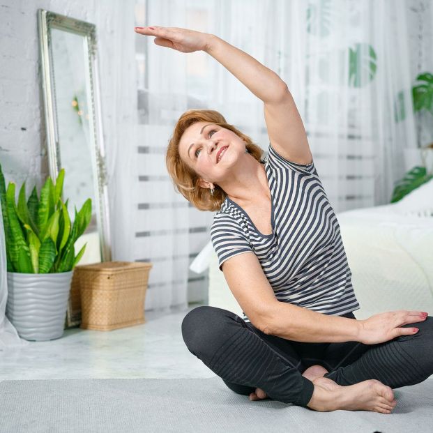 bigstock Senior Woman Exercising While  354761096