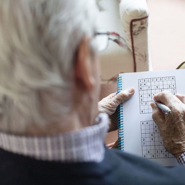 bigstock Senior Man Doing Sudoku Puzzle 331089862