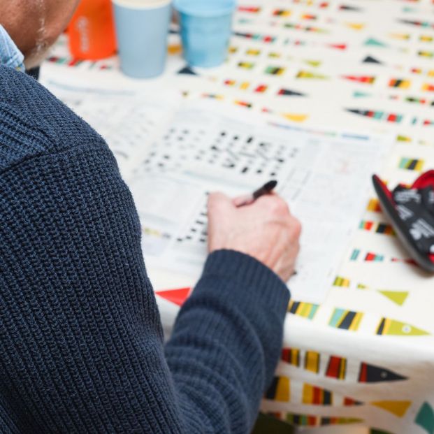 bigstock Mature Man Doing A Crossword P 352204967