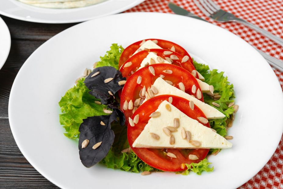 bigstock Salad With Fresh Tomatoes And  397474607