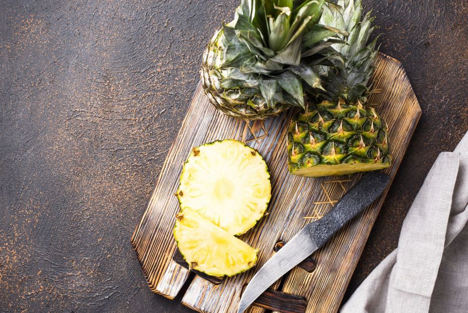 bigstock Fresh Ripe Sliced Pineapple On 313557979