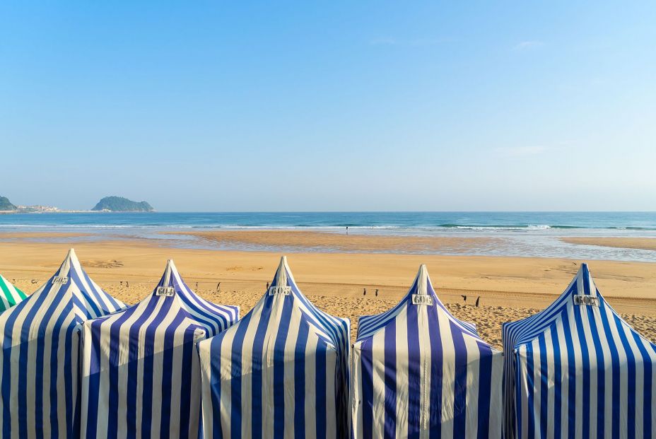 bigstock Colorful Tents Of Zarauz Beach 249411946