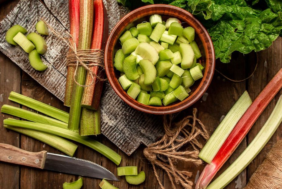 bigstock Rhubarb Stalks On A Board Rhu 391068443