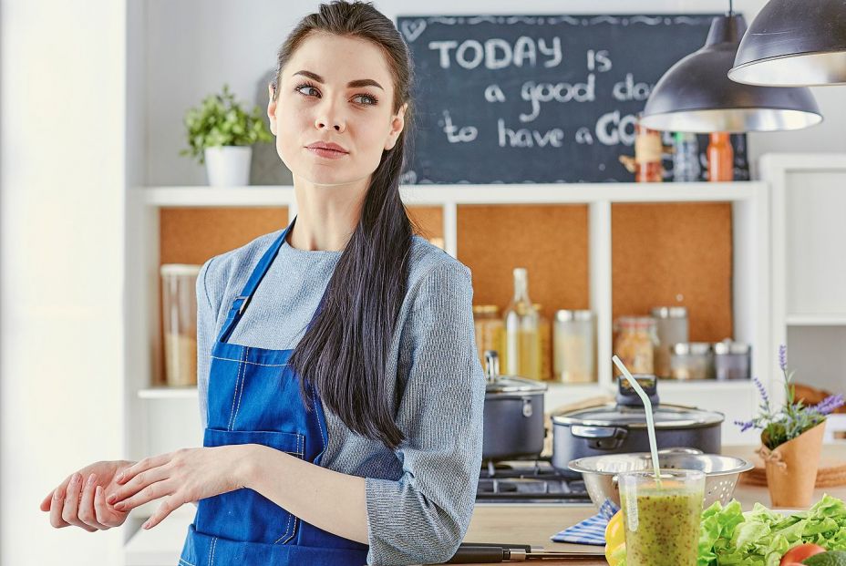 bigstock Beautiful Woman In The Kitchen 393236780