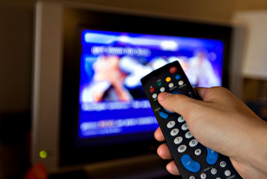 bigstock Hand pointing a tv remote cont 18496238