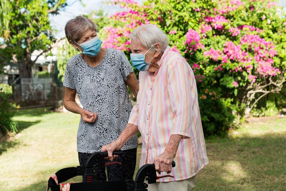 bigstock Carer Helping Elderly Lady To  369995914