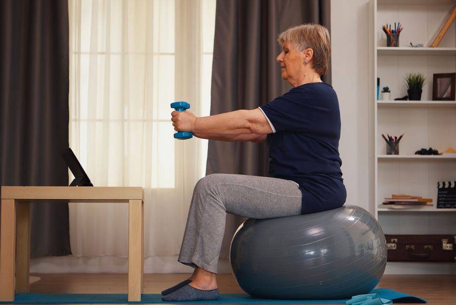 bigstock Senior Woman Exercising With D 393241670