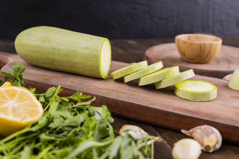bigstock Slices Of Zucchini On A Wooden 407429870
