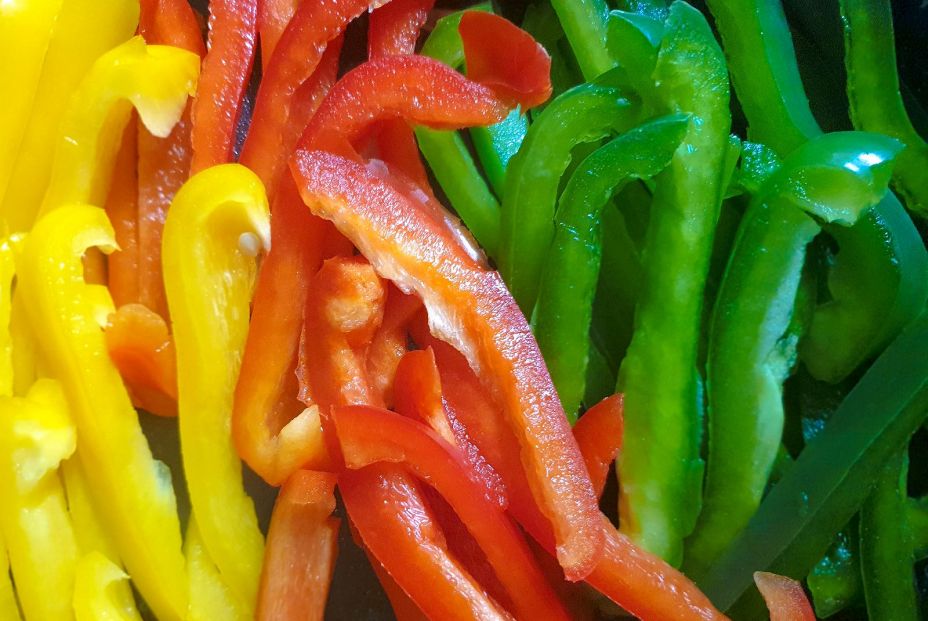 bigstock Red Green And Yellow Peppers  340955569