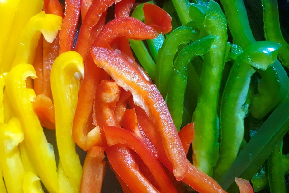 bigstock Red Green And Yellow Peppers  340955569