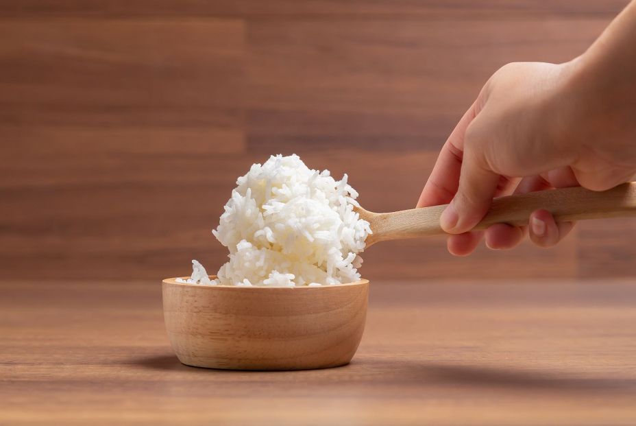 bigstock Woman Hand Is Scooping Jasmine 393660005