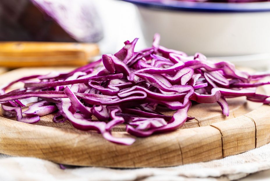 bigstock Sliced fresh red cabbage on cu 404757521