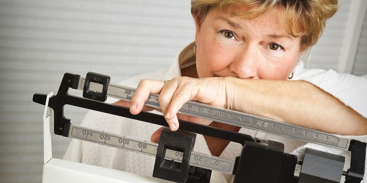 Похудеть в климакс женщине 50 лет. Климакс лишний вес. Набор веса при климаксе. Ожирение в менопаузе картинки. Фотосток менопауза и лишний вес.