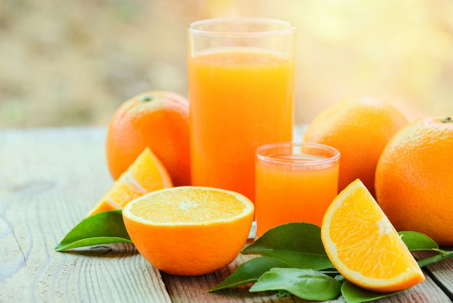 bigstock Fresh Orange Juice In The Glas 407350976