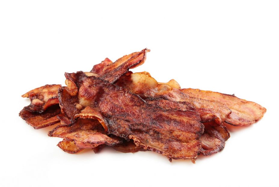 bigstock Crispy Strips Of Bacon Isolate 414693245