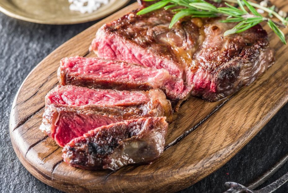 bigstock Medium rare Ribeye steak or be 249727720