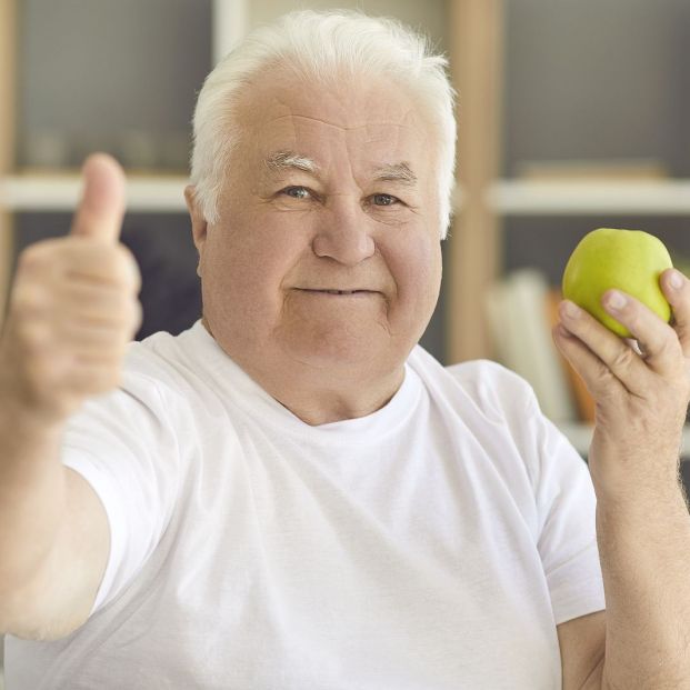 bigstock Happy Senior Man Looking At Ca 387558508