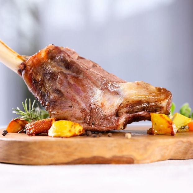 bigstock roasted lamb leg on wooden boa 411092911