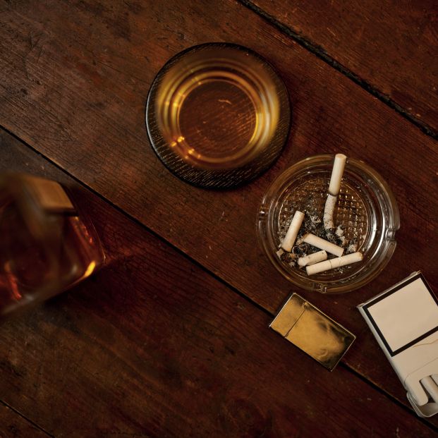 bigstock Cigarettes in ashtray alcohol 420778412