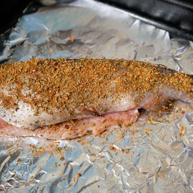 bigstock Fish Fillet Sprinkled With Dry 384794909