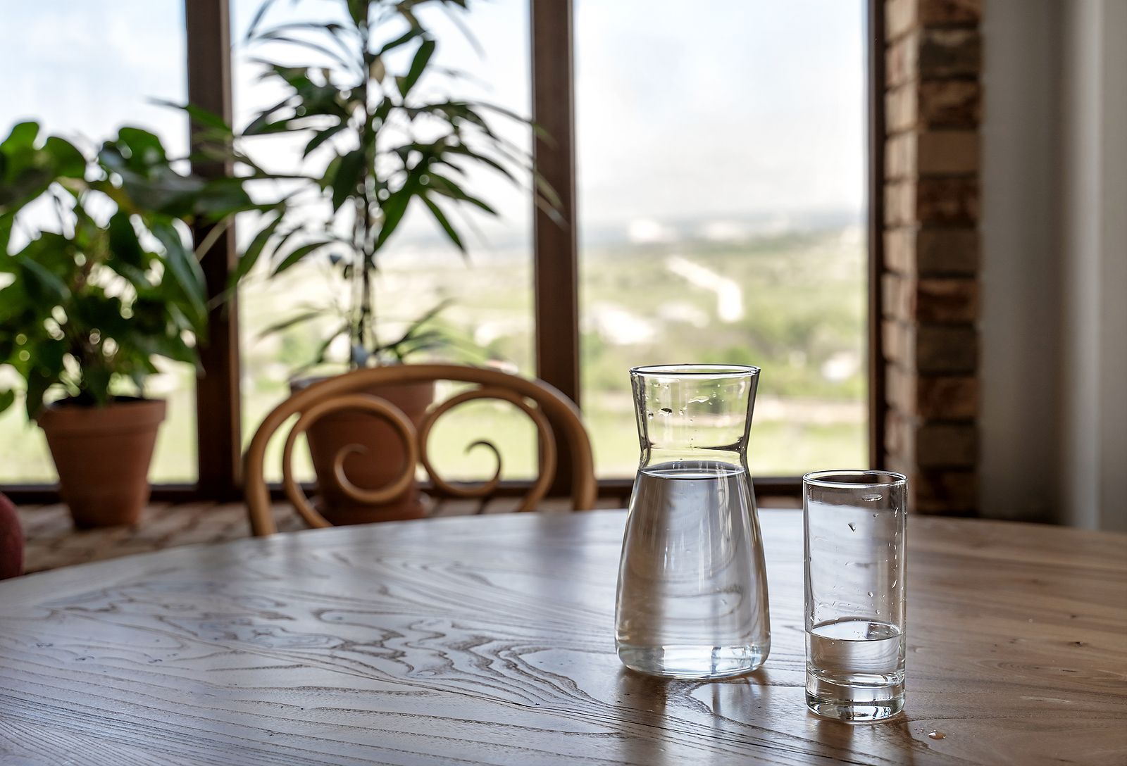 bigstock Water In Jug And Glass On Wood 425557202